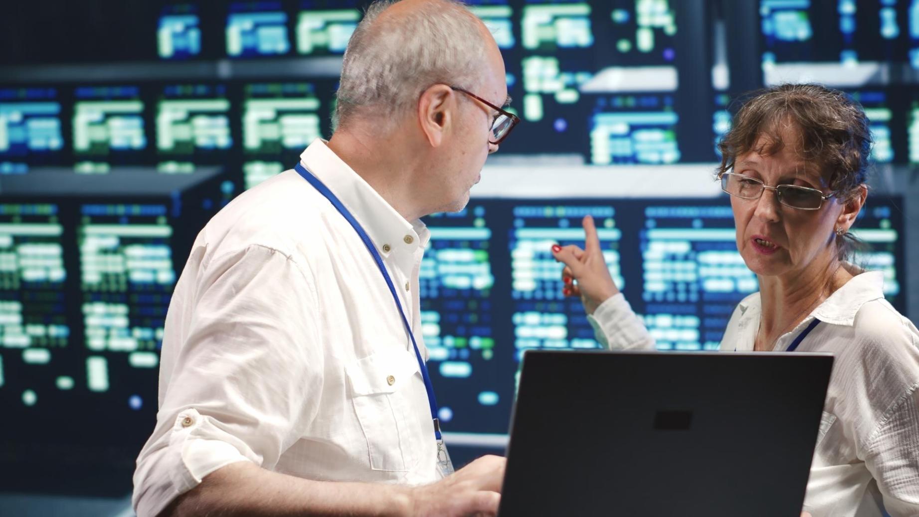 Students working in cybersecurity lab environment